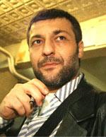 M. Enis Tayman