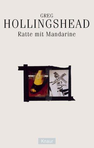 Ratte mit Mandarine.
