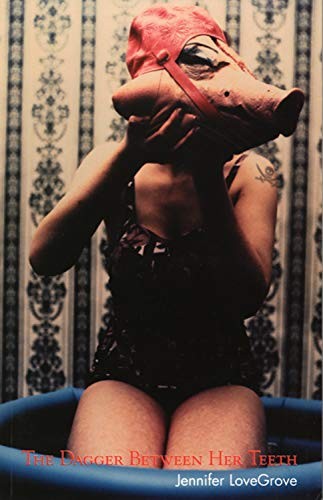 The dagger between her teeth